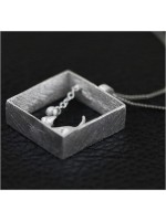 Collier "Chat qui joue à la balle" 3D en argent